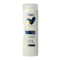 Dove Body milk essential nourishment 250 Milliliter